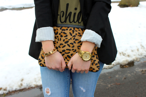 leopard print clutch and distressed denim