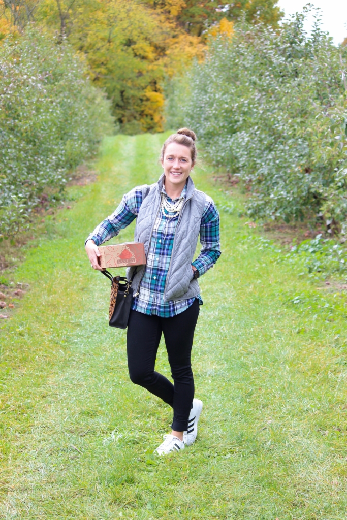 Flannel and Quilted Vest with Black Jeans and Adidas Superstar Sneakers