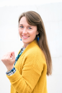 Old Navy Mustard cardigan with royal blue tassel earrings