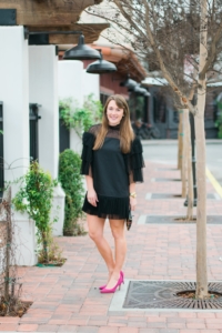 Dezzal Tiered Black Mini Dress with Pink Pumps and Sequin Clutch