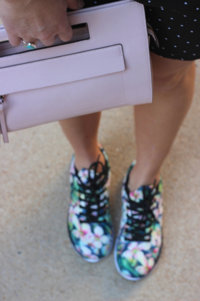 Black and White Polka Dot Dress with Floral Sneakers and Blush Purse