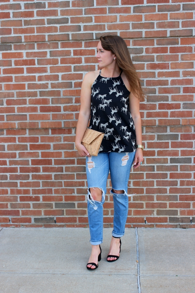 Old Navy Zebra Print Tank top with distressed jeans, cork envelope clutch and black heeled sandals