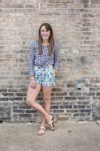 Floral shorts and gingham blouse with summer sandals