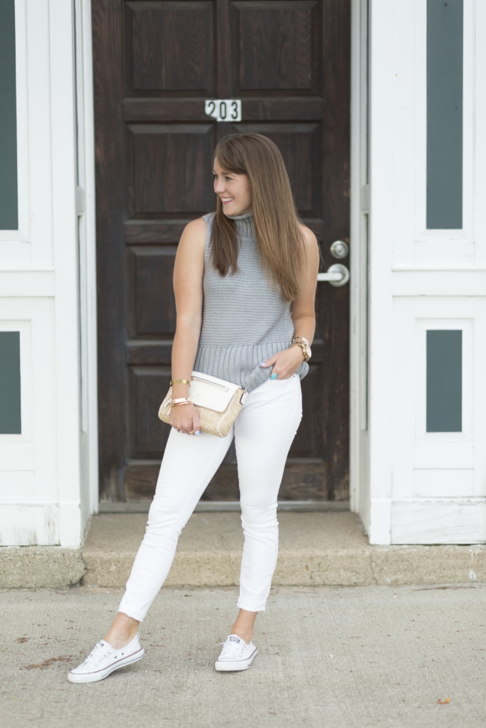 Sleeveless Gap sweater with white jeans and converse