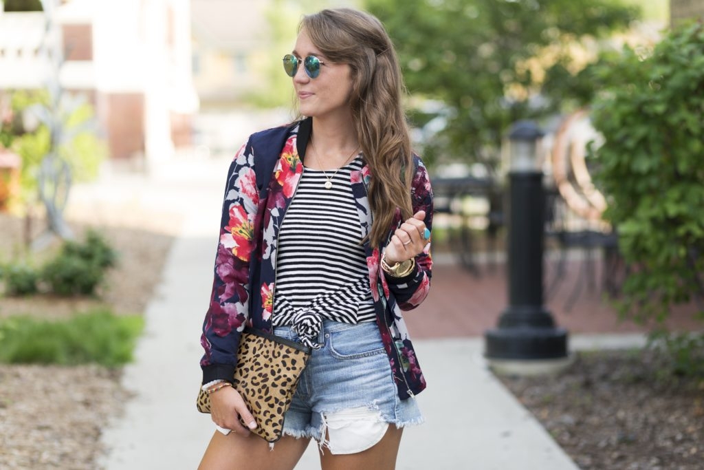 Jean shorts with striped tank, floral bomber and leopard clutch