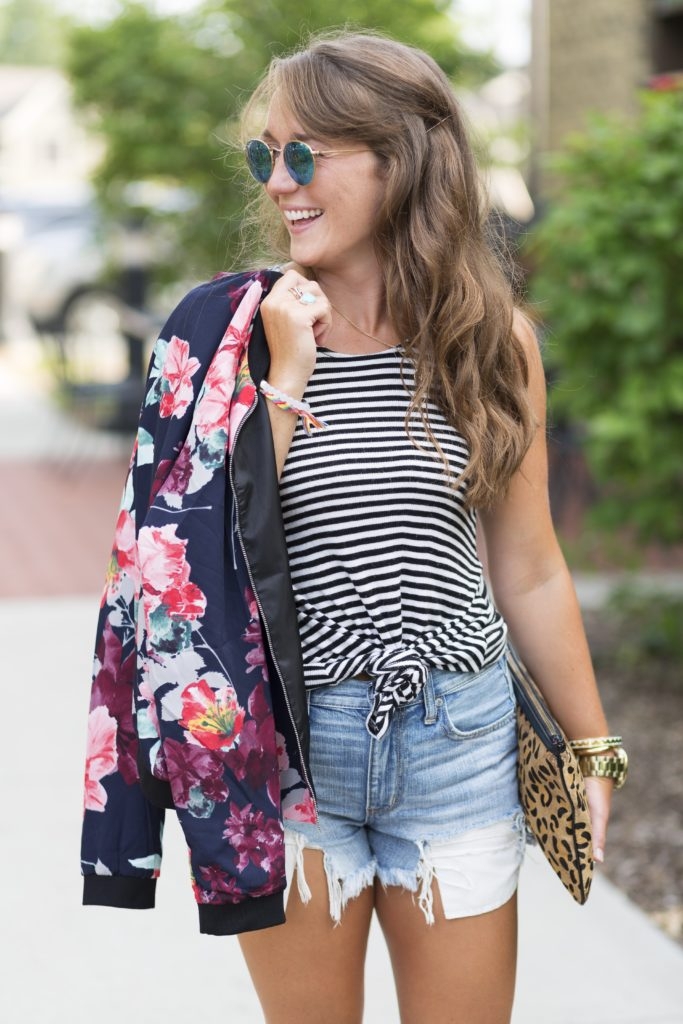 Jean shorts with striped tank, floral bomber and leopard clutch