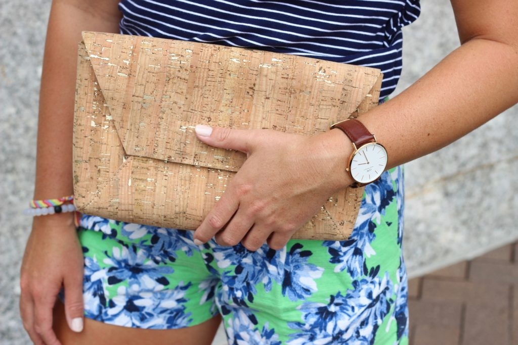 Cork clutch with Daniel Wellington watch, floral shorts and striped top