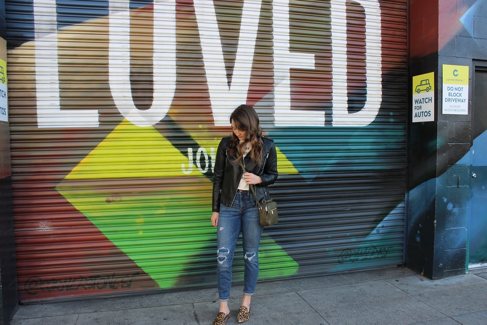 Graphic tee and leather jacket outfit in San Francisco