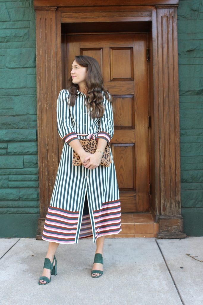 Green striped Boden midi dress with leopard clutch on Cassidy Lou