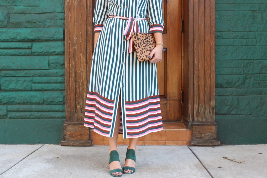 Green striped Boden midi dress with leopard clutch on Cassidy Lou