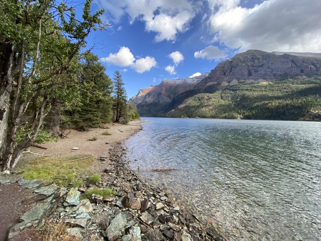 On the shore of Saint Mary Lake in Glacier National Park by Madeline Mihaly