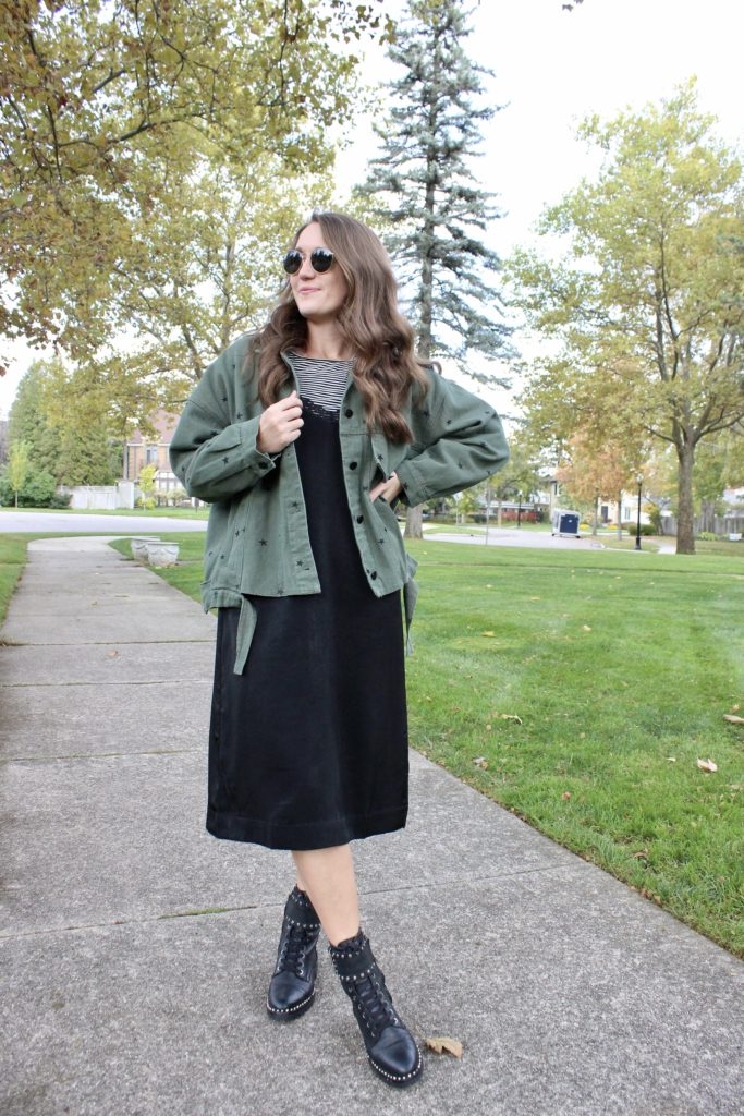 Styling a black slip dress with combat boots, cargo jacket and striped tee by Madeline Mihaly