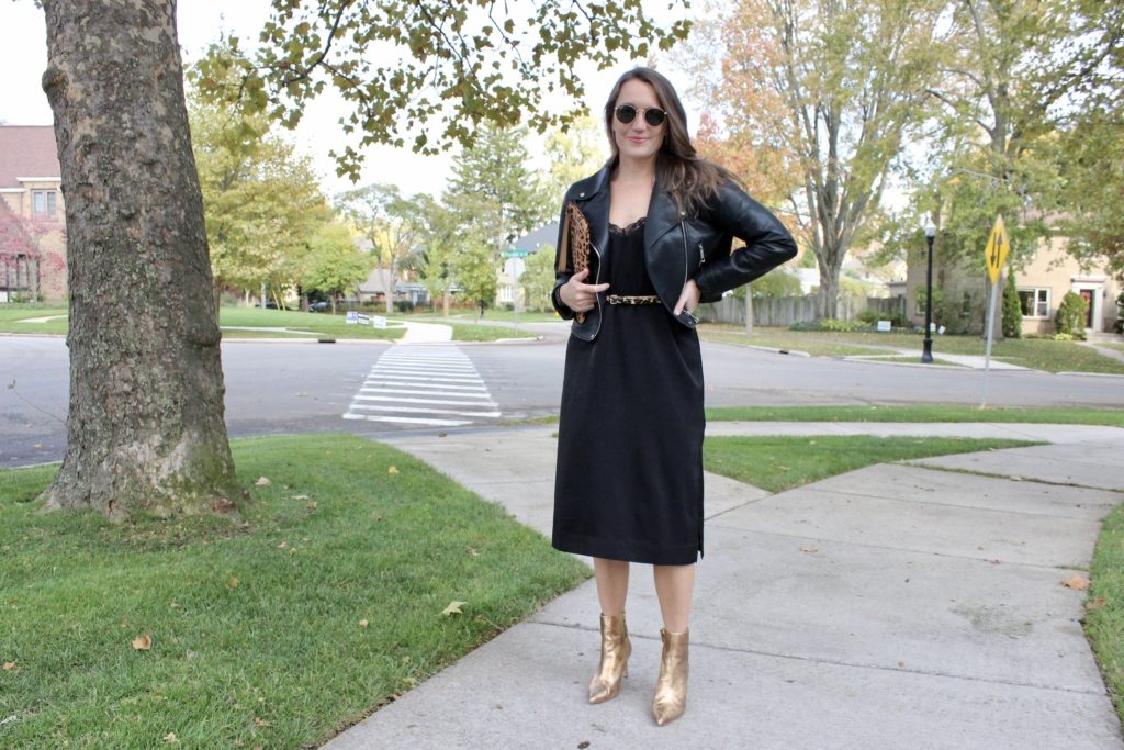 Styling a black slip dress with gold boots by Madeline Mihaly